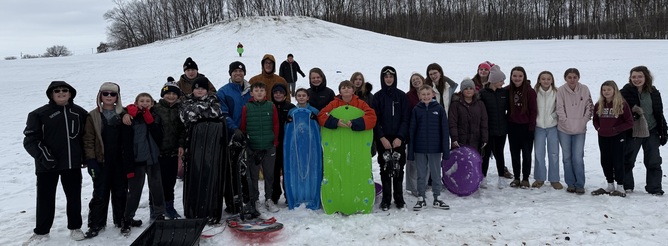 students sledding